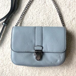 MK crossbody light blue bag